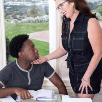 Over sixty gal Maria Fawndeli tempts a younger black boy while tutoring him